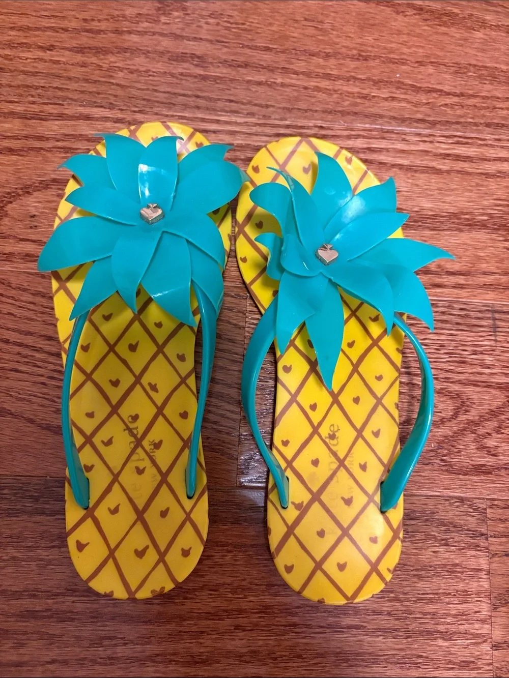 Kate Spade pineapple flip flops